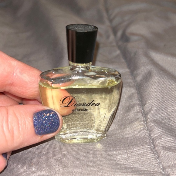 Diandra Perfume, 33.8 fl oz. Like new with a little missing. - Picture 1 of 3